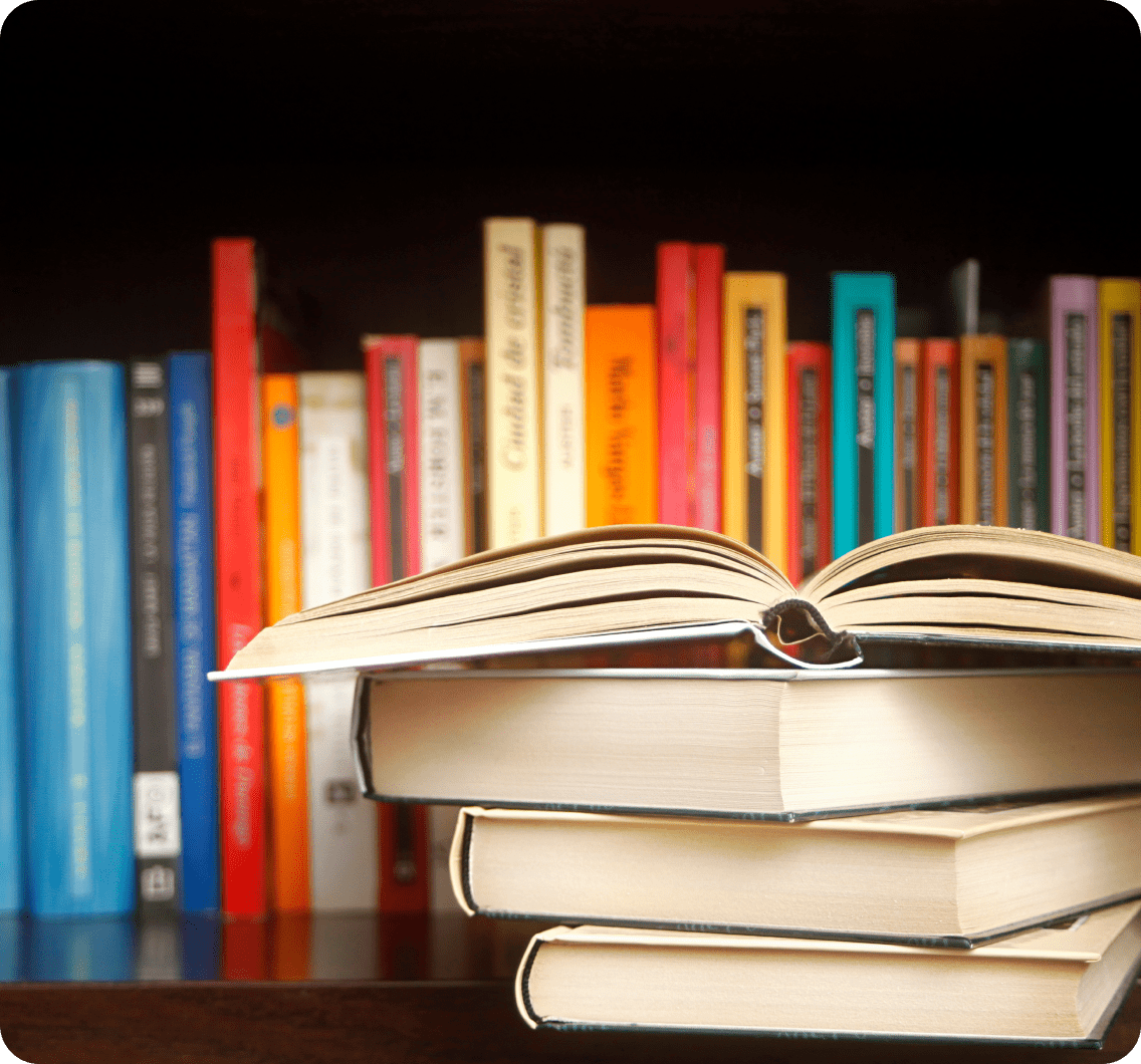 Open book on stacked books
